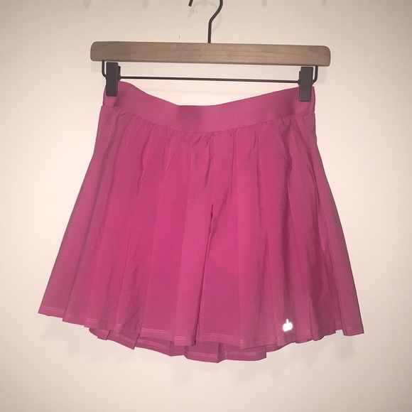 ALO Yoga Dresses & Skirts - Alo tennis skort in paradise pink